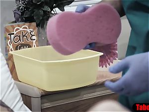 physician gives patient a sponge bathtub and vaginal probe